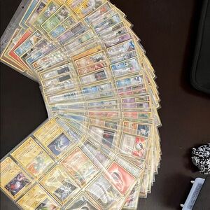 31 Pages of Pokemon cards (front and back, 18 cards per page)